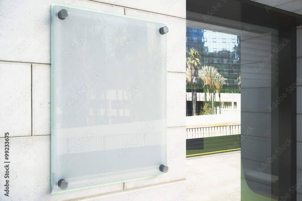 Blank glassy signboard on the wall outdoor, mock up