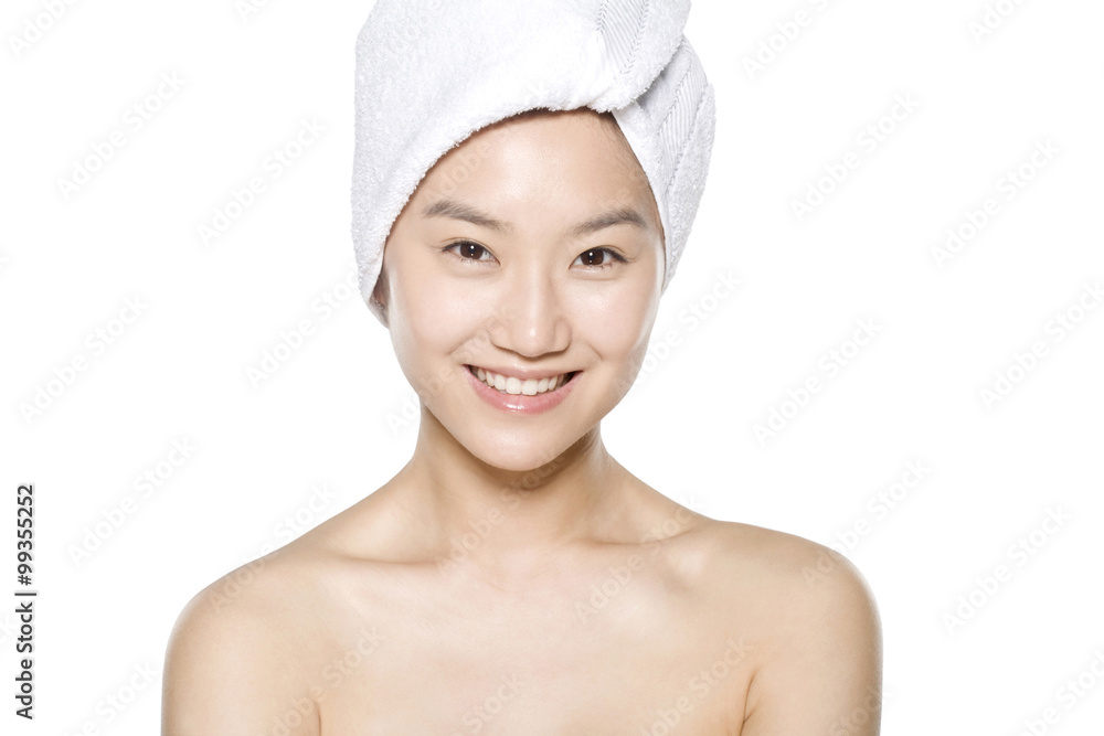 Beauty shot of a young woman in a towel