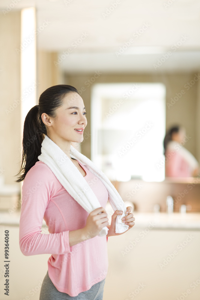 Young woman with towel