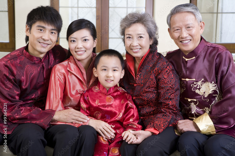 Three generation family in traditional Chinese clothes