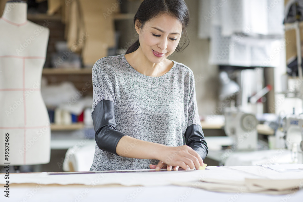 Fashion designer working in studio