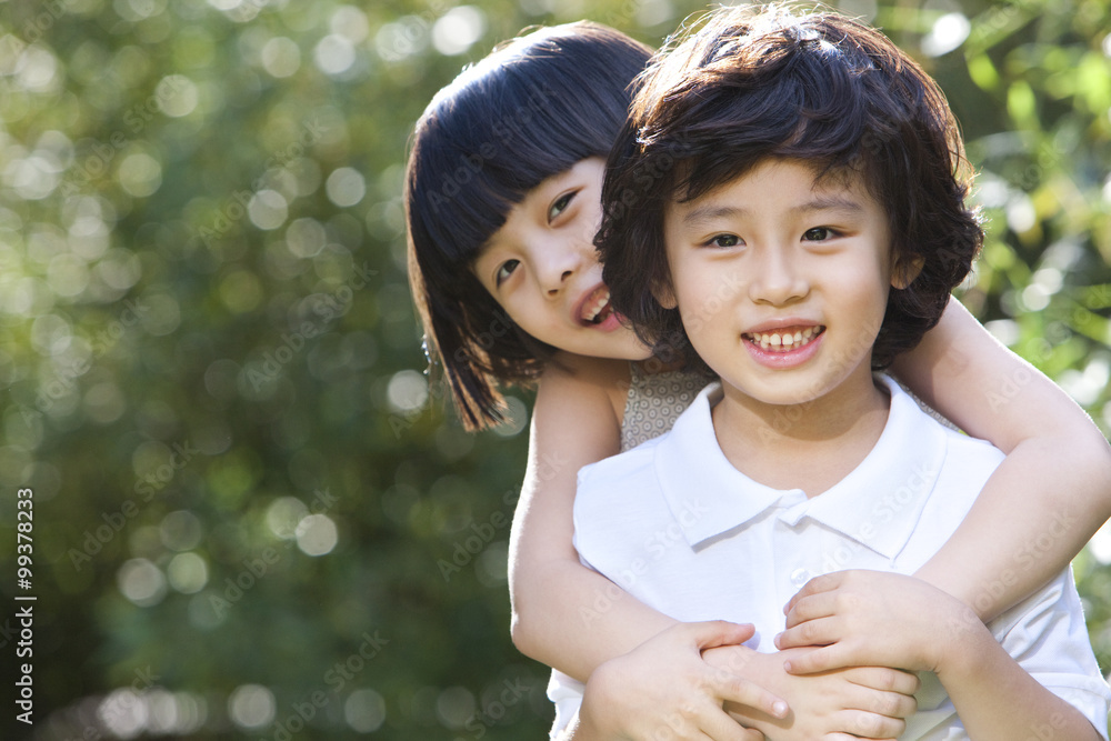 Cute children having fun in garden