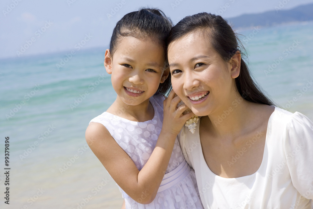 Mother and daughter at the beach