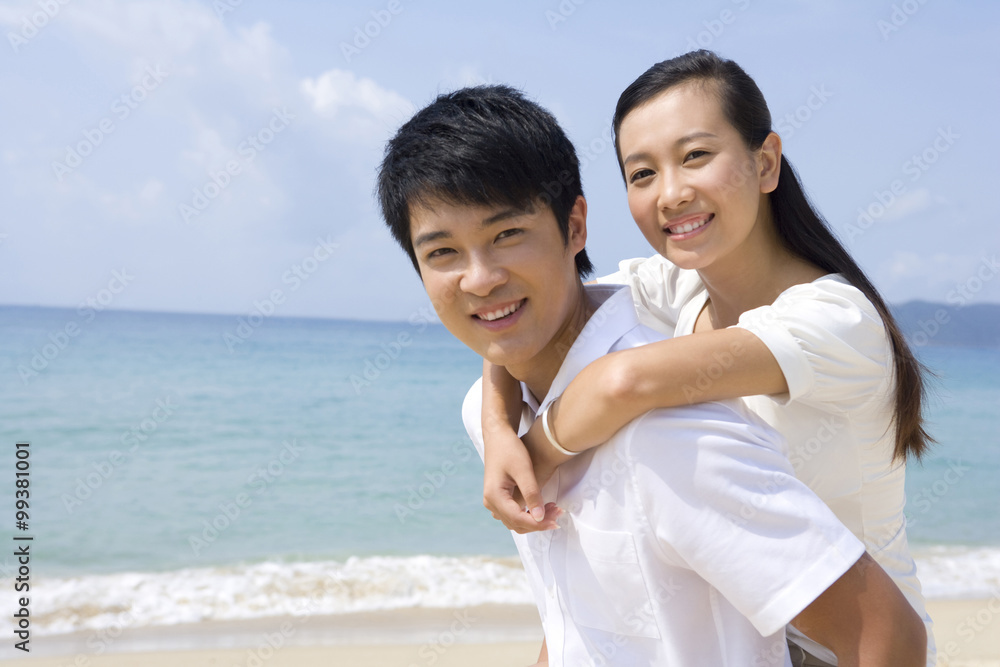 Portrait of a young couple on the beach