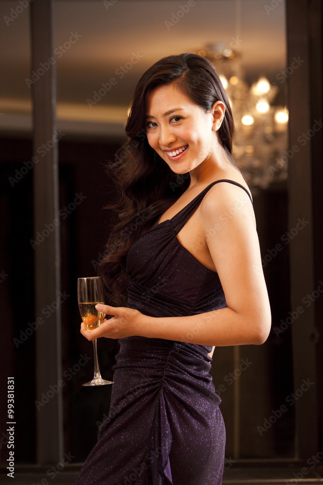 Young woman in evening gown