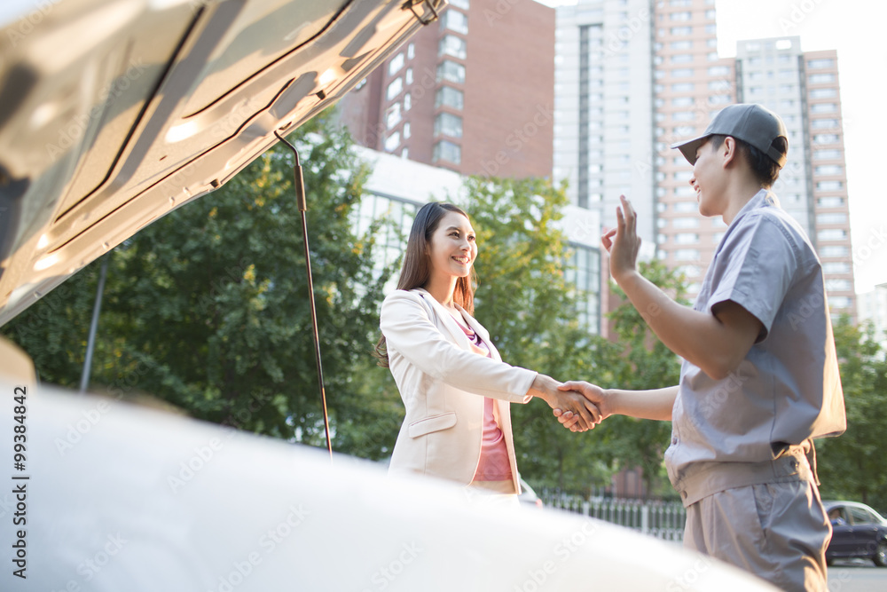 Auto mechanic and car owner