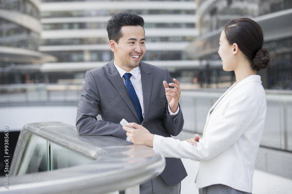 Business person talking outdoors