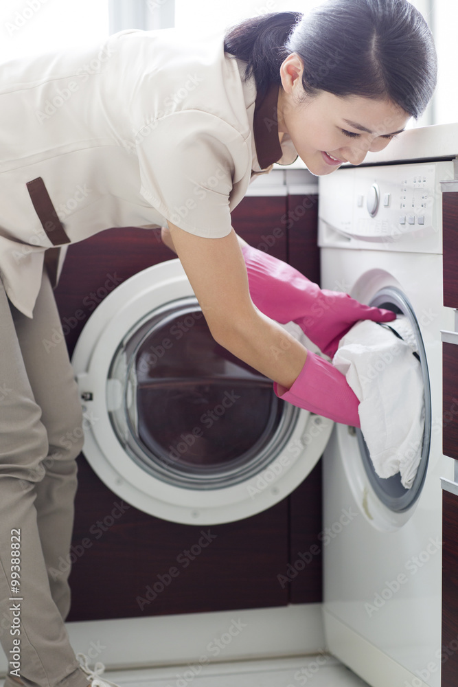 Domestic staff doing laundry