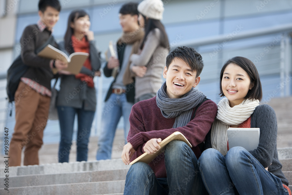 Portrait of young couple in college