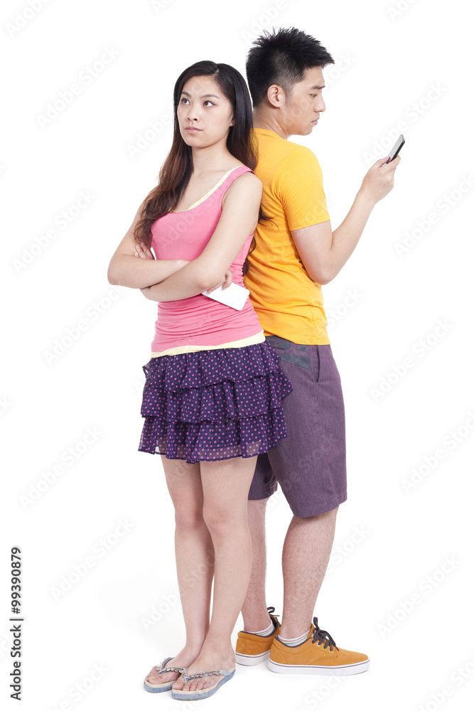 Young couple ignoring each other