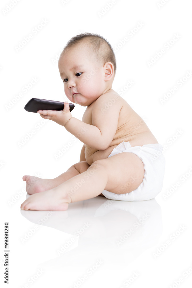 Cute baby boy with mobile phone