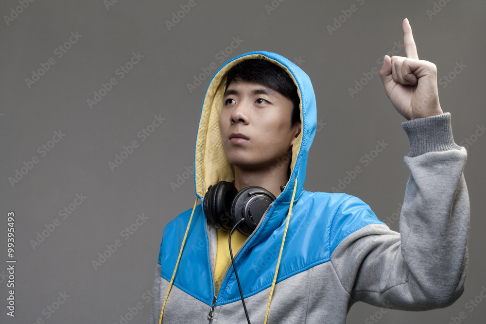 Guy in Hoodie with Fist Upraised