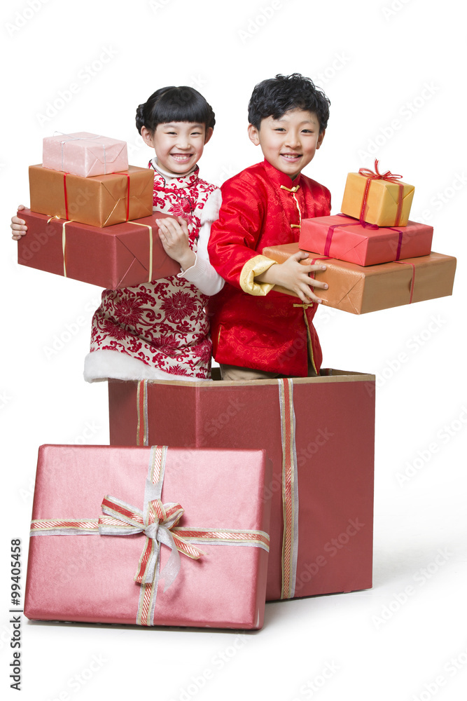 Happy children holding many Chinese new year gifts