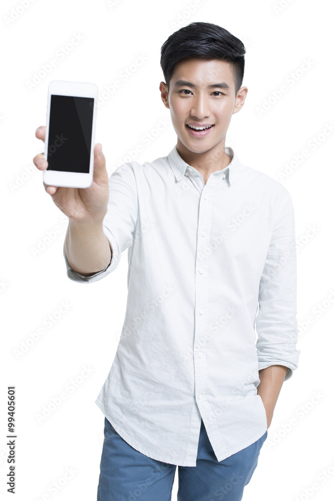 Young man showing smart phone