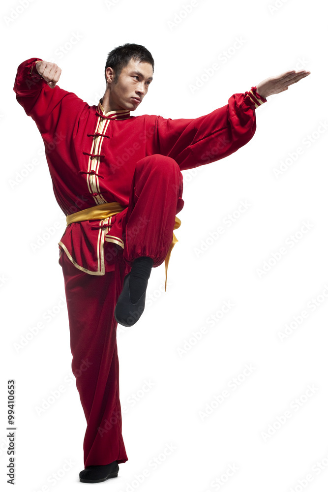 Focused Man Doing Martial Arts in Chinese Clothing