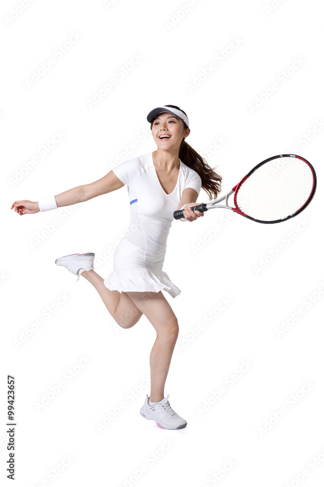 Young woman playing tennis