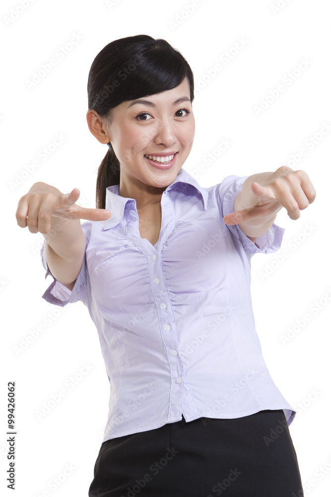 Portrait of a Confident Businesswoman Pointing