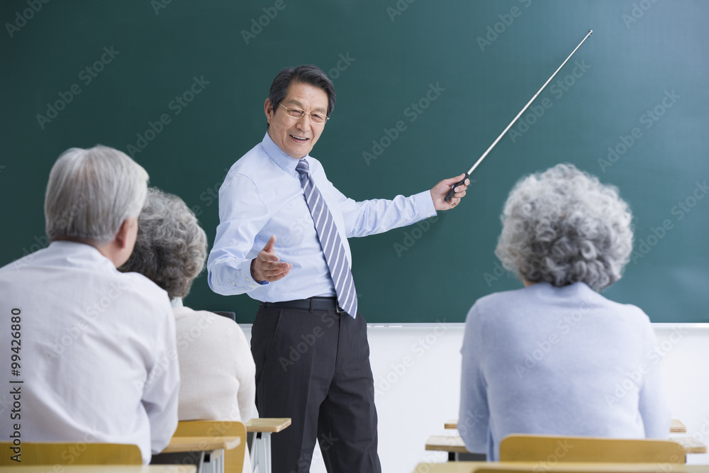 Senior adults having class at school