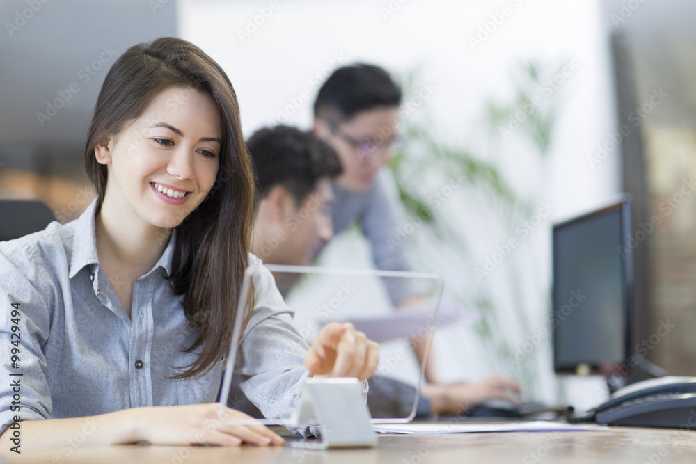 IT workers developing digital tablet