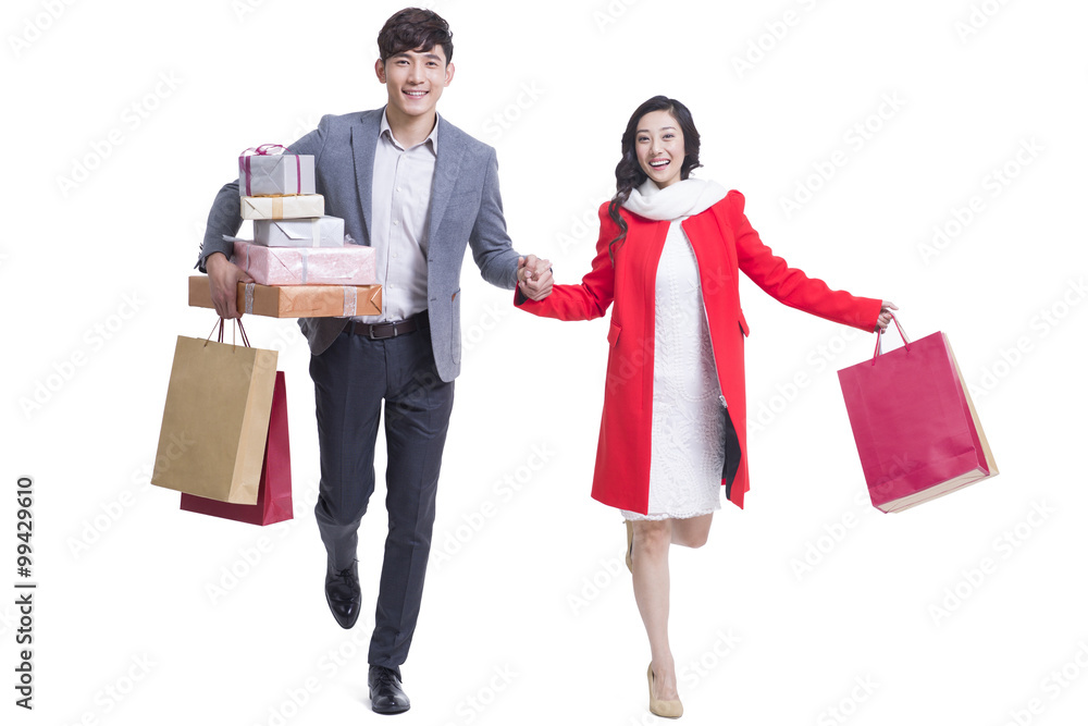 Happy young couple going shopping