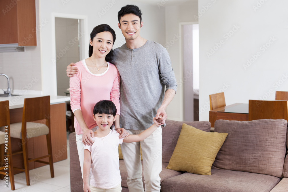 Portrait of happy family at home