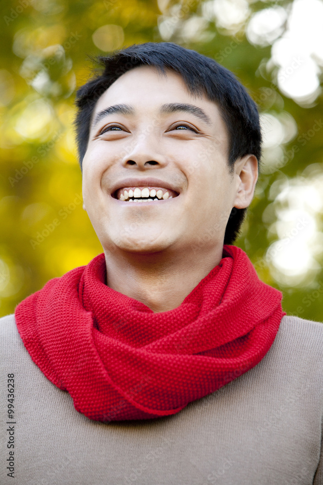 Young Man in a Park in Autumn