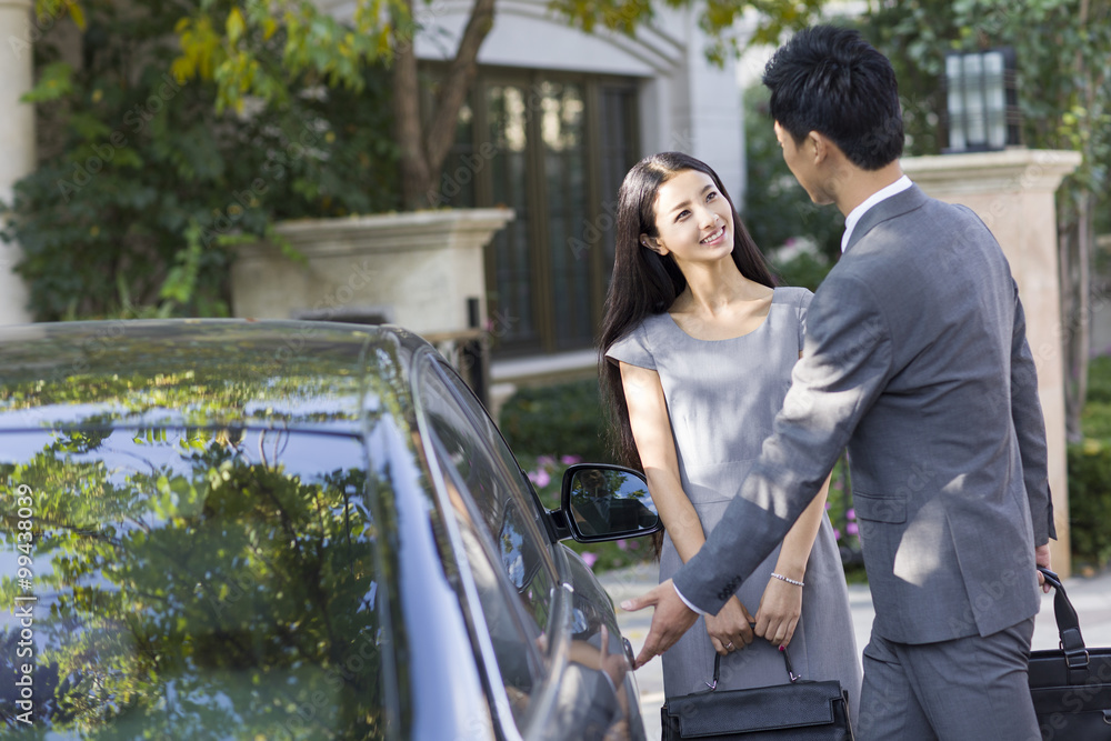 Young couple and car