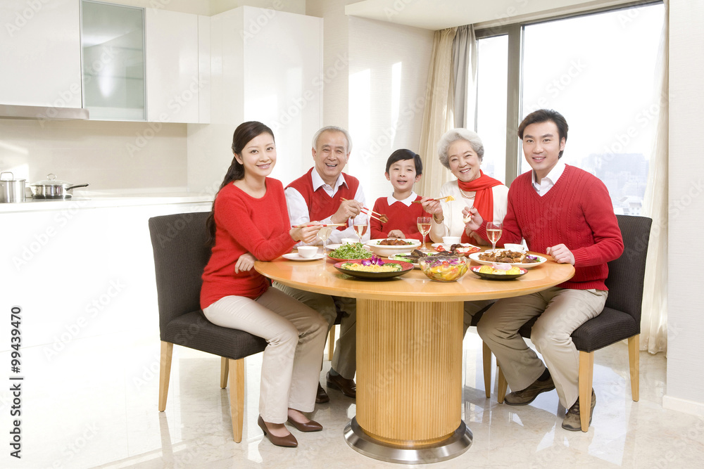 Three generations enjoying a Chinese New Year dinner together