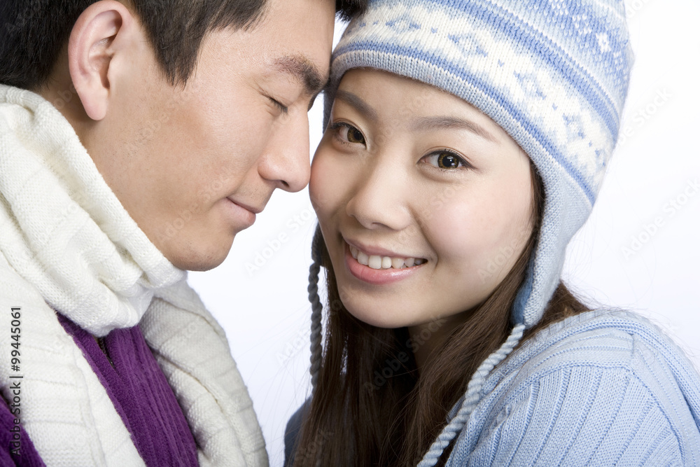 Young couple in winter clothes