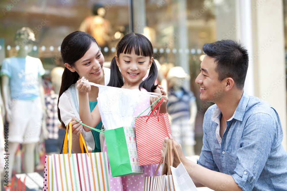 Family shopping in department store