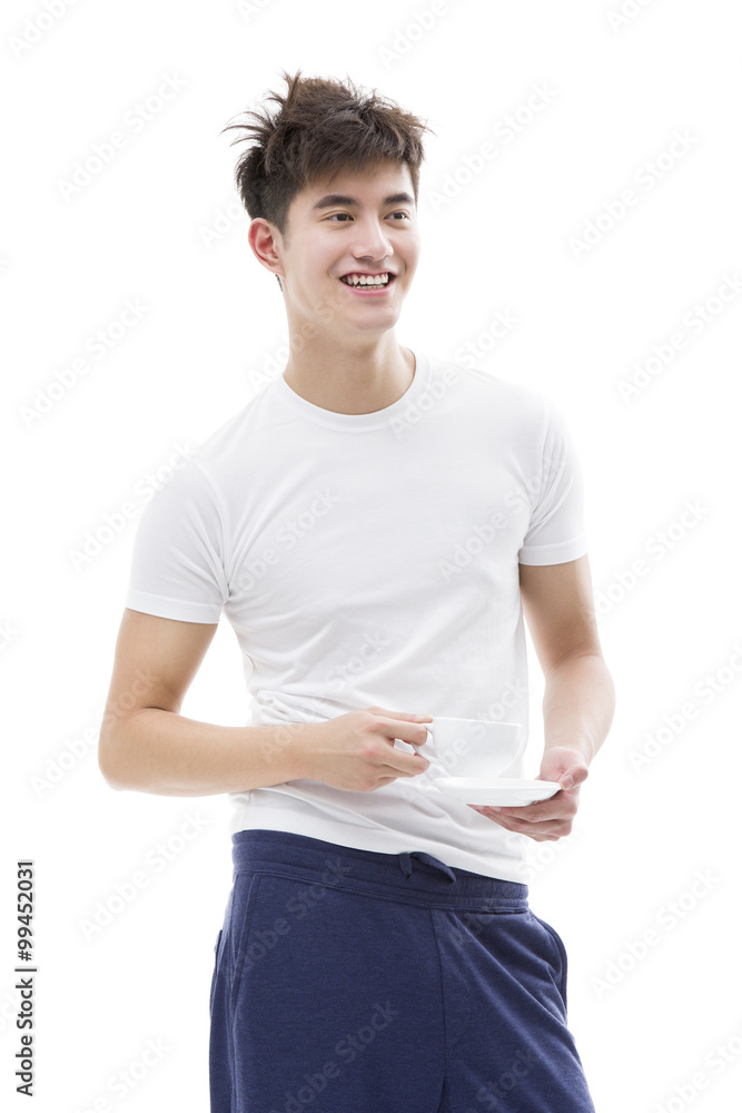 Young man drinking coffee in the morning