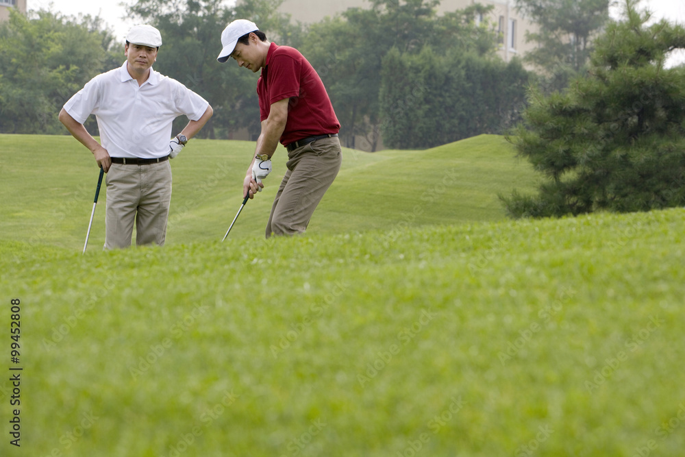 Two Golfers on the Course