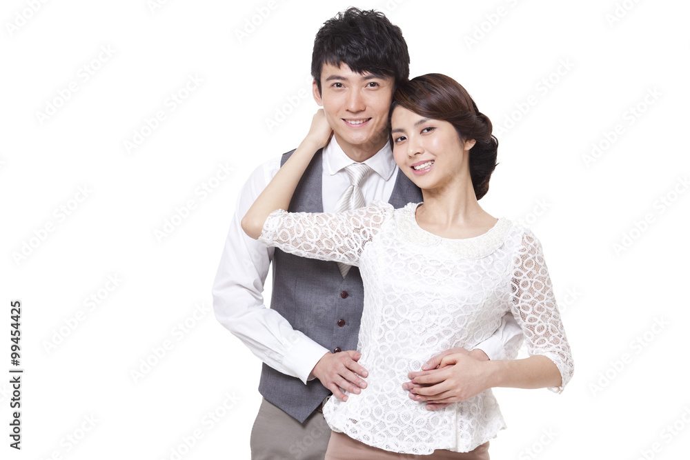 Portrait of happy young couple