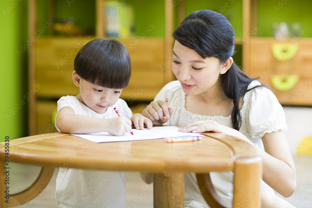 Mother and daughter practicing drawing