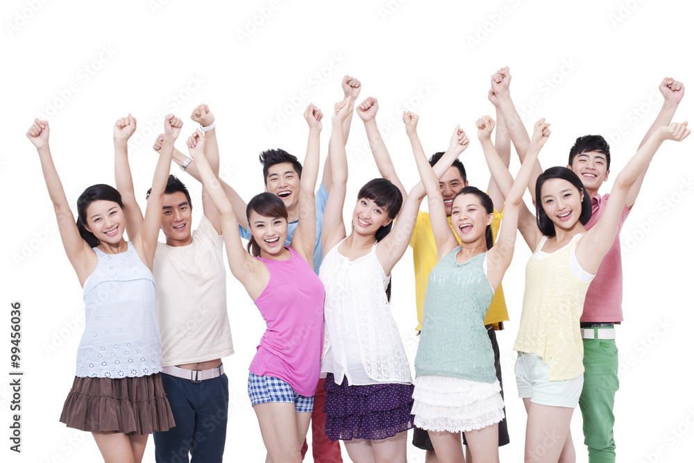 Group of young people raising arms