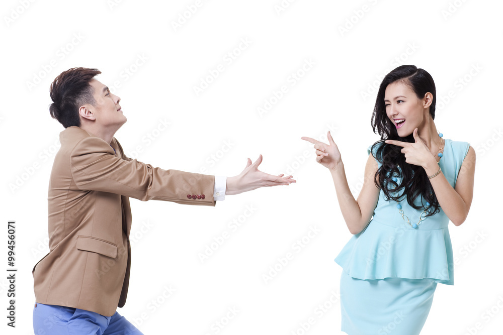 Stylish young woman and man presenting