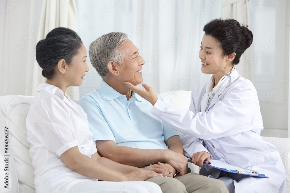 Family doctor examing senior patient