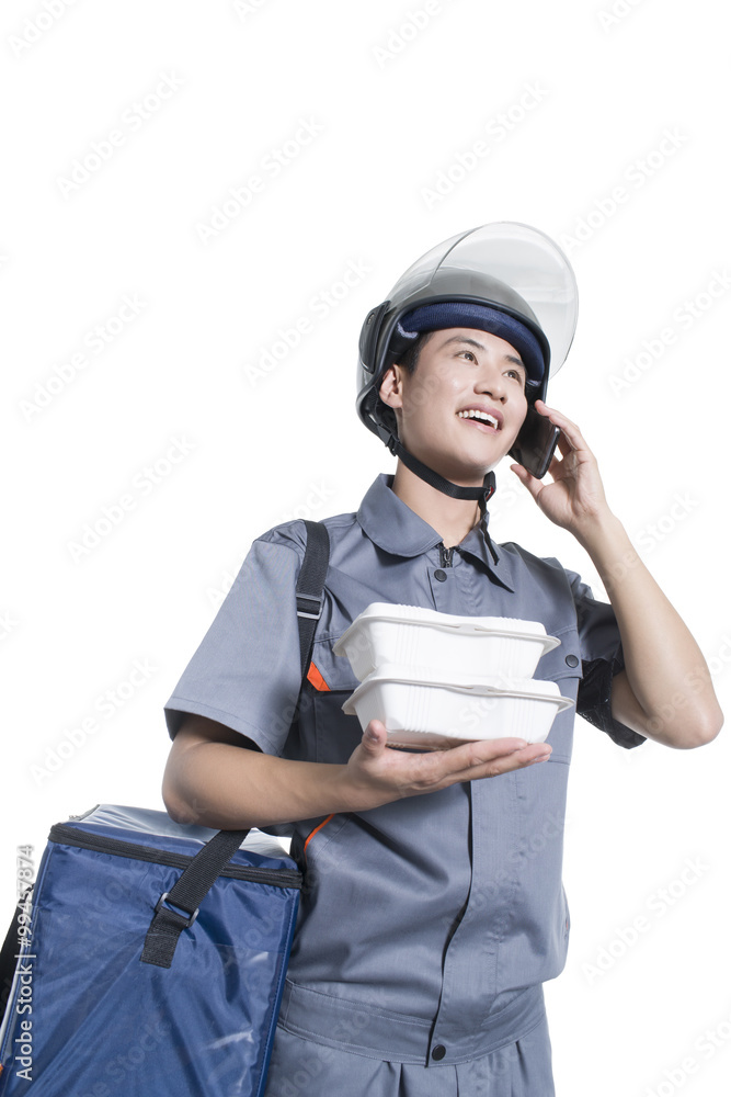 Take-out deliveryman talking on the phone