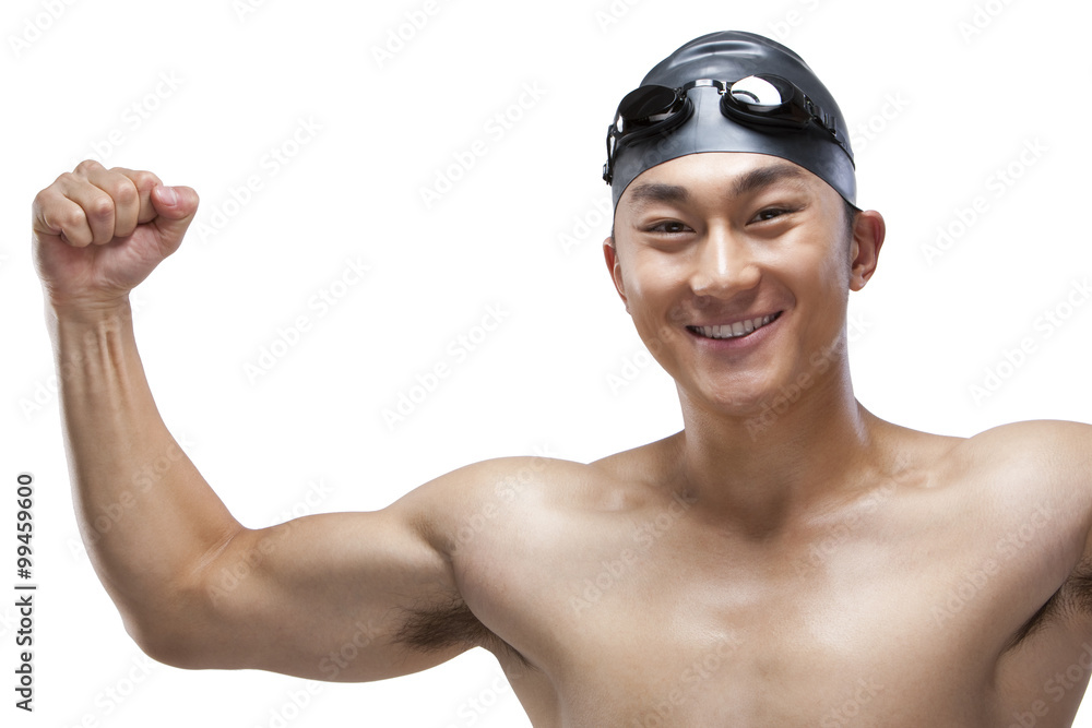 Swimmer flexing his muscles