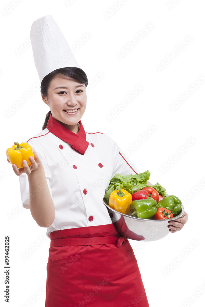 Female cook with bell pepper