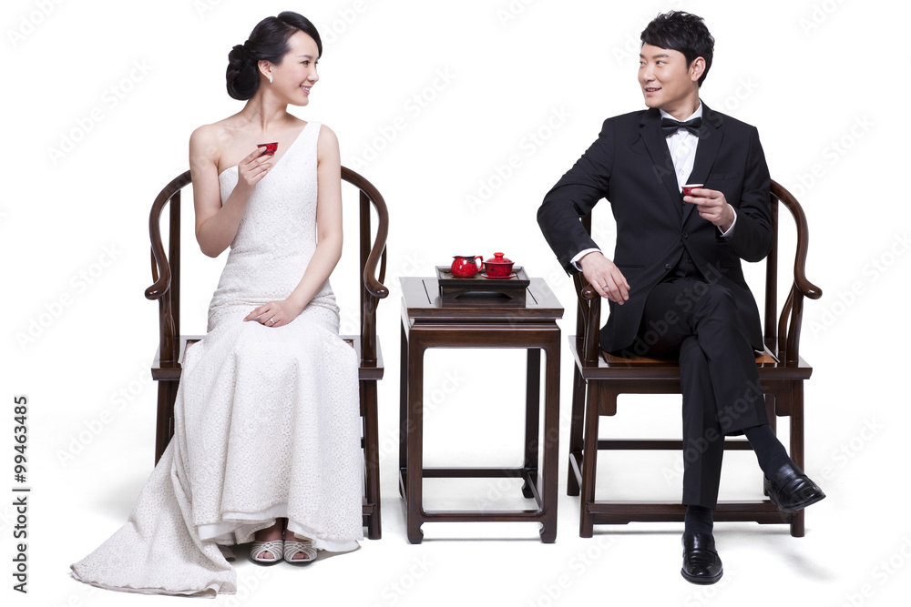 Elegant couple having tea