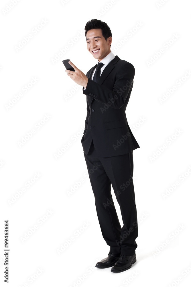 Businessman using cellphone