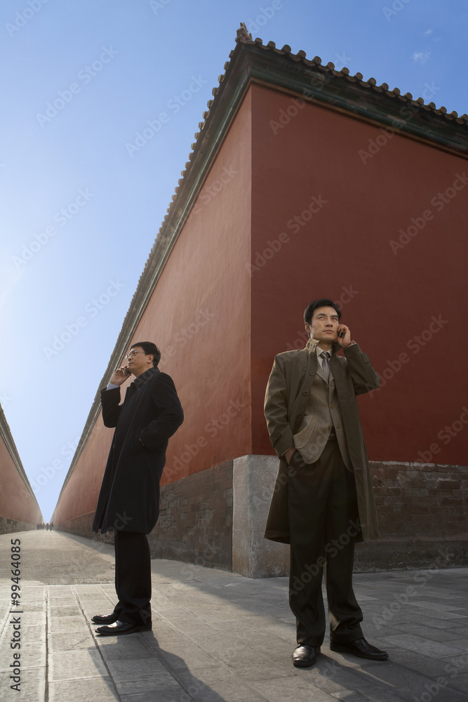 Businessmen Next To Building Exterior , 