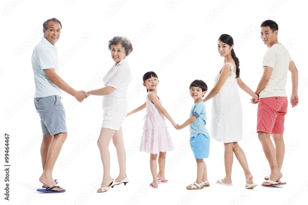 Happy family holding hands