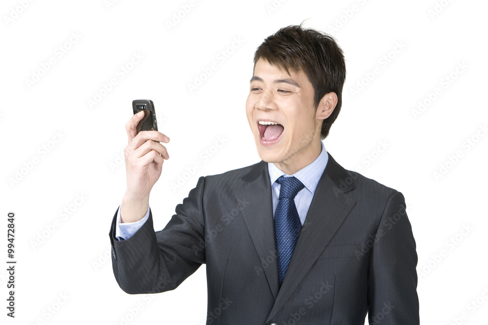 Young businessman using a mobile phone