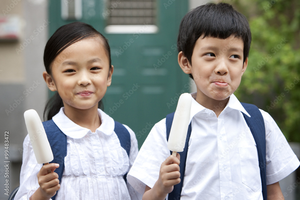 Happy children with popsicles