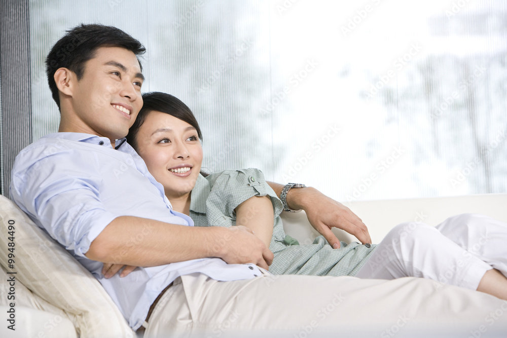 Portrait of a couple relaxing on the couch