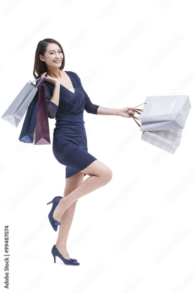 Cheerful young woman shopping