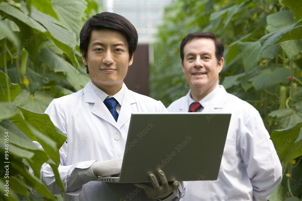 Scientists doing research in modern farm