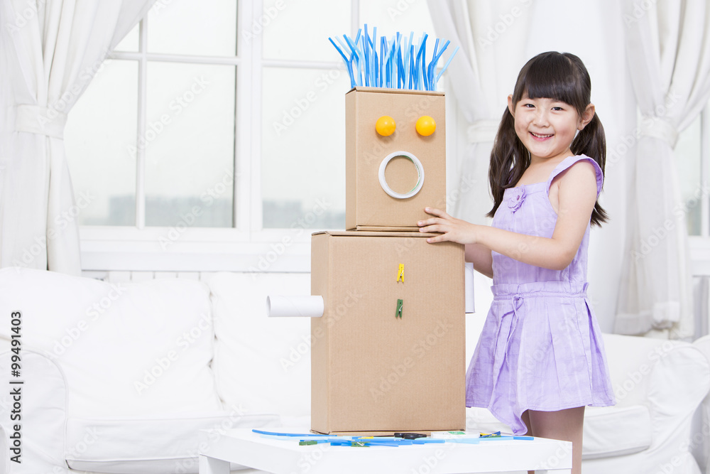 Girl and a DIY toy robot